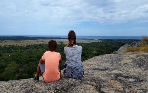 Cheryle and her son looking out over Sri Lankan landscape